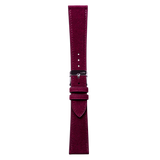Close-up of the Burgundy Alcantara texture and hand-stitched seam.